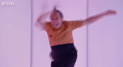 Man Jumping In Yellow Shirt And Black Skirt GIF