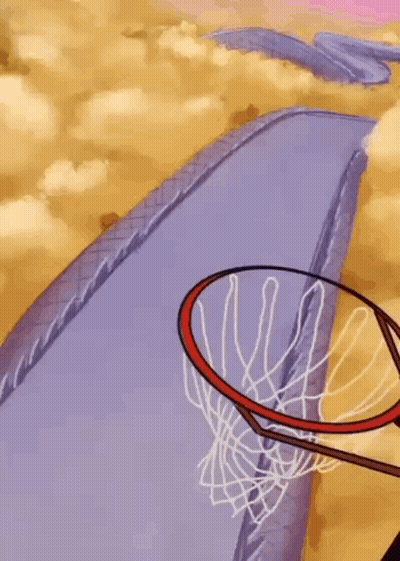 Man Jumping Into Basketball Hoop With Ball
