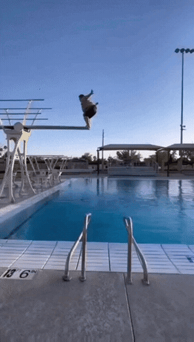 Man Jumping Off Diving Board GIF