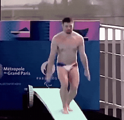 Man Jumping Off Diving Board GIF