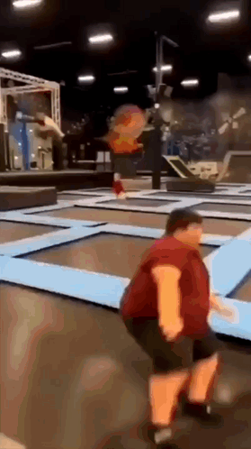 Man Jumping On Trampoline GIF