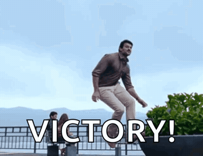 Man Jumping Over Fence With Victory GIF