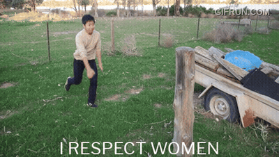 Man Jumping Over Fence