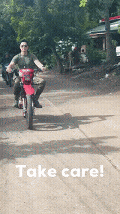 Man Jumping Over Rock Holding Rope GIF