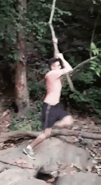 Man Jumping Over Rock With Rope GIF
