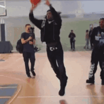 Man Jumping With Basketball GIF