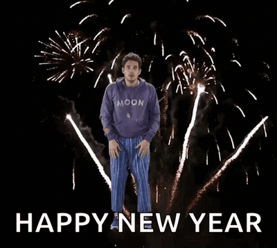 Man Jumping With Fireworks Happy New Year GIF