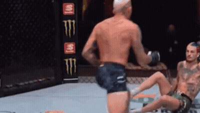 Man Kicking Another Man In Knee During Boxing Match GIF