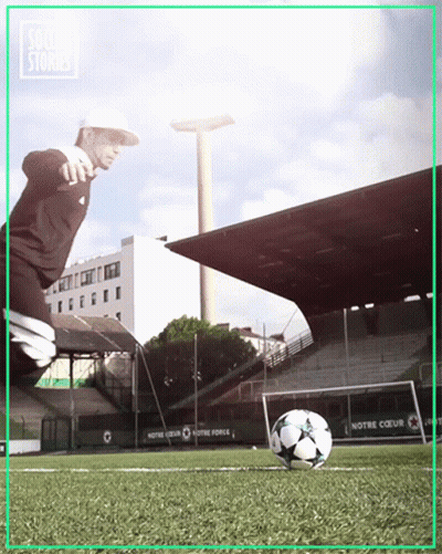 Man Kicking Soccer Ball At Notre Coeur Stadium GIF