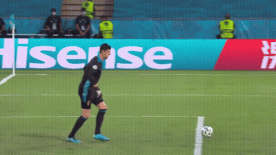 Man Kicking Soccer Ball By Hisense Sign GIF