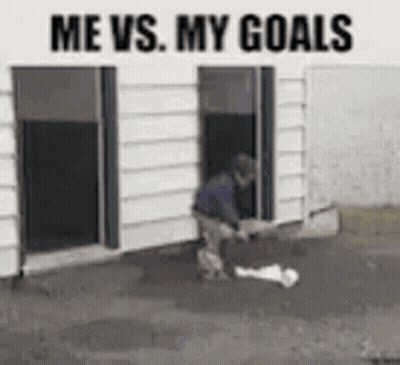 Man Kicking Soccer Ball In Front Of Building Saying Me Vs. My Goals GIF