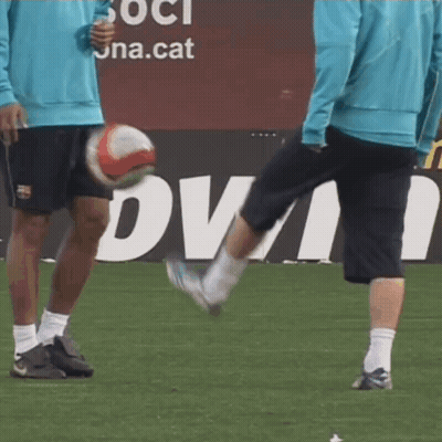Man Kicking Soccer Ball In Front Of Dva Sign GIF