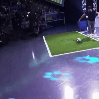 Man Kicking Soccer Ball On Field Number 3 GIF