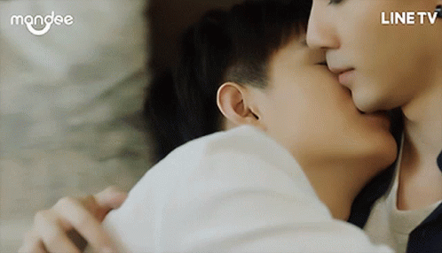 Man Kissing Another Man With Line TV Logo GIF