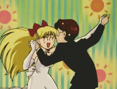Man Kissing Girl On Cheek Obsessed With Sailor Moon GIF