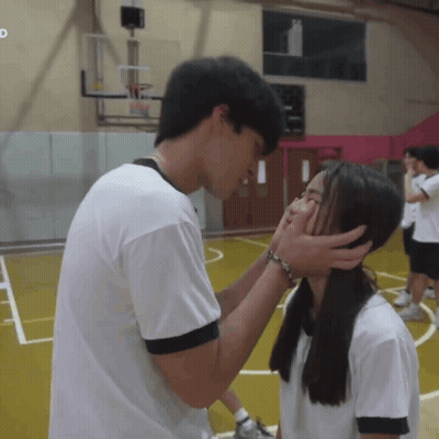Man Kissing Girl On Forehead In Gym With D GIF