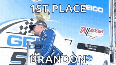 Man Kissing Trophy At Race Track GIF