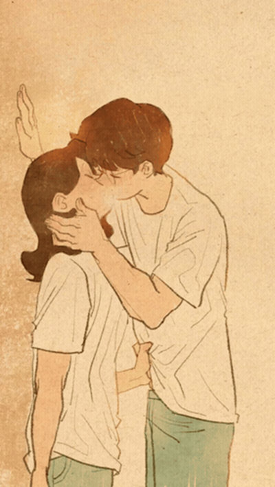 Man Kissing Woman Against Wall