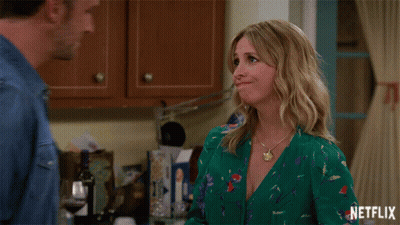 Man Kissing Woman Forehead With Netflix Logo GIF