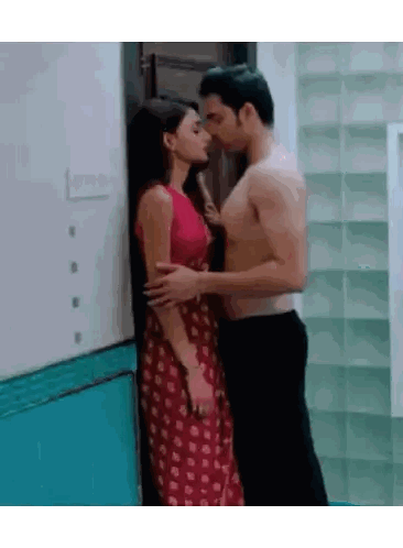 Man Kissing Woman In Red Dress Sticker
