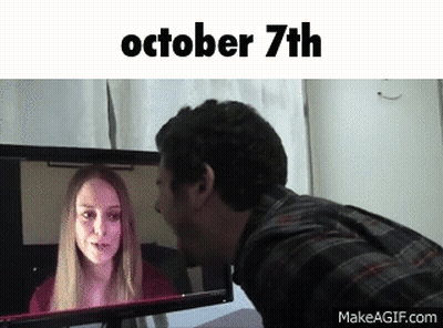 Man Kissing Woman On Cheek Looking At October 7Th Screen GIF