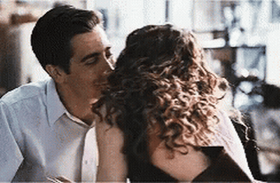 Man Kissing Woman On Forehead GIF