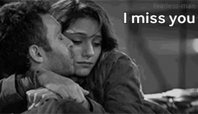 Man Kissing Woman On Forehead GIF