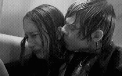 Man Kissing Woman On Forehead Black And White GIF