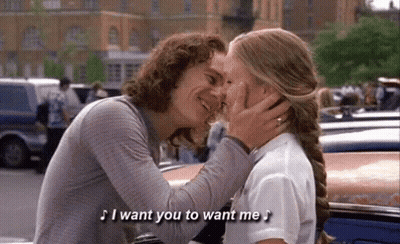 Man Kissing Woman On Forehead Saying I Want You To Want Me GIF