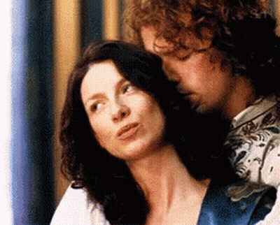 Man Kissing Woman On Neck GIF