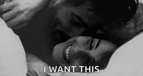 Man Kissing Woman On Neck GIF