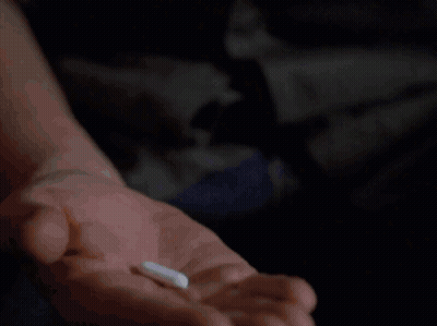 Man Kneeling At Piano With Bluegrass Book GIF