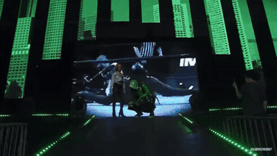 Man Kneeling Before Eddie Estrada Sign GIF