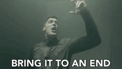 Man Kneeling Before Wall Saying Bring It To An End GIF