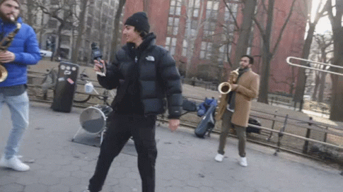 Man Kneeling By Fresh Coffee Sign GIF