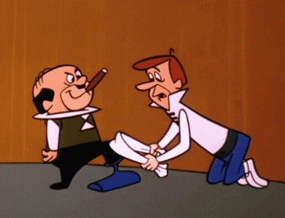 Man Kneeling Holding Another Man's Leg GIF