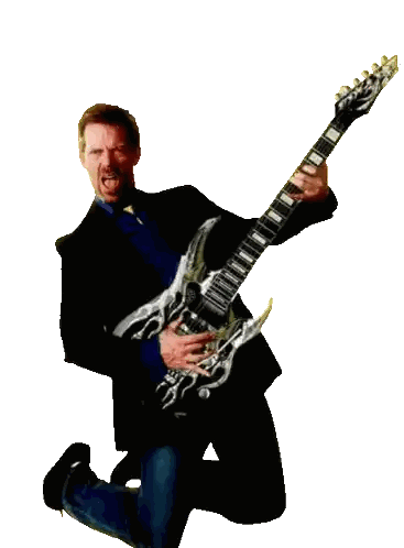 Man Kneeling Holding Guitar With Skull Sticker
