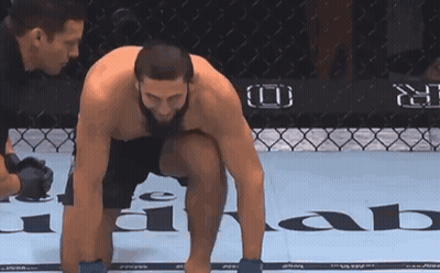 Man Kneeling In Boxing Ring GIF