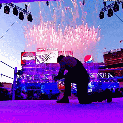 Man Kneeling In Front Of Levi's Stadium GIF