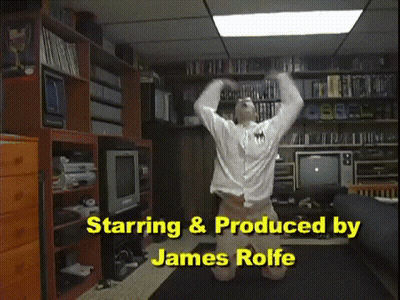 Man Kneeling In Living Room GIF