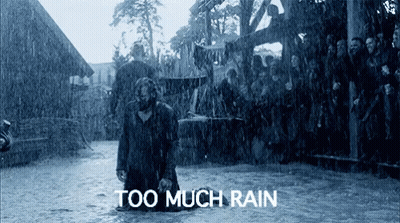 Man Kneeling In Rain Saying Too Much Rain GIF