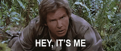 Man Kneeling In Woods Saying Hey GIF