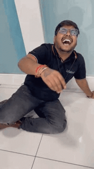 Man Kneeling Laughing Making Funny Face GIF