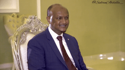 Man Kneeling Next To Baby With Man Face Picture GIF