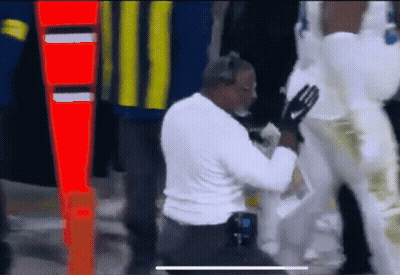 Man Kneeling Next To Man In White Pants GIF