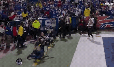 Man Kneeling On Football Field During Game GIF