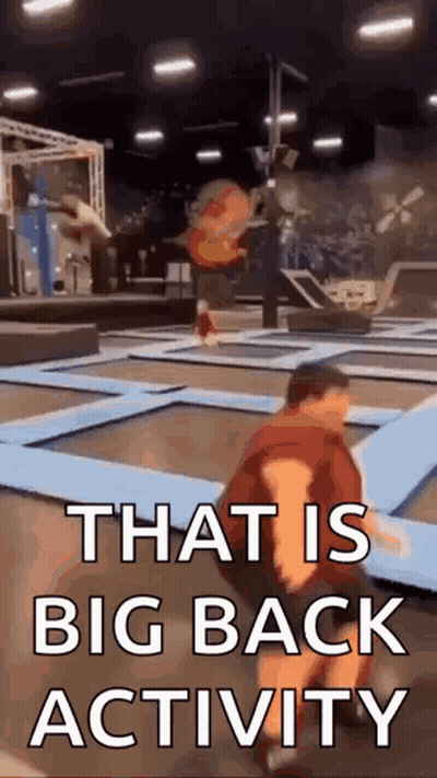 Man Kneeling On Trampoline That Is Big Back Activity GIF