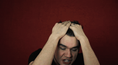Man Kneeling Please Stand By Red Letters GIF