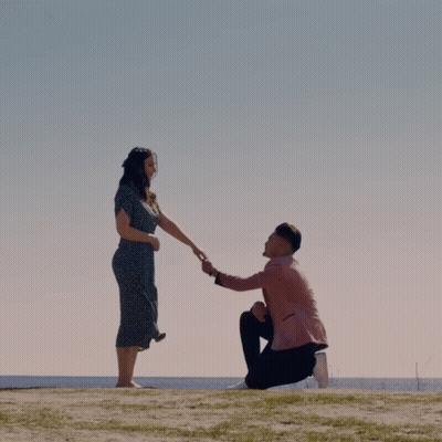 Man Kneeling Proposing To Woman GIF