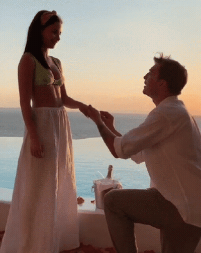 Man Kneeling Proposing To Woman GIF